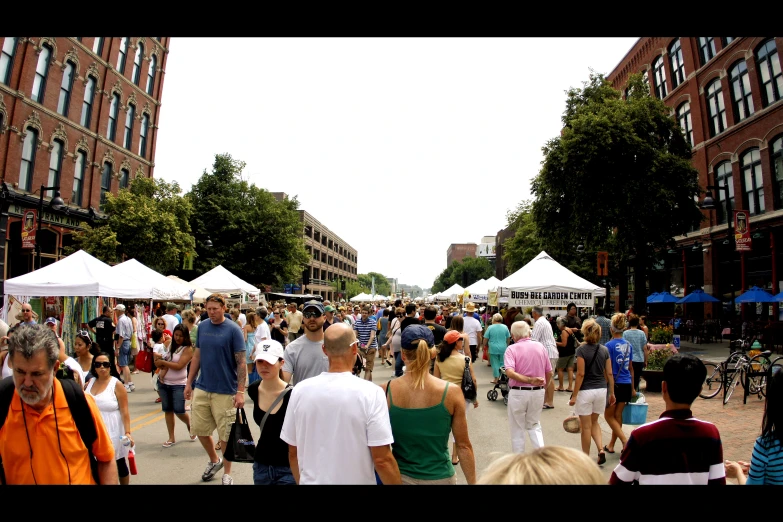 a large group of people that are walking around