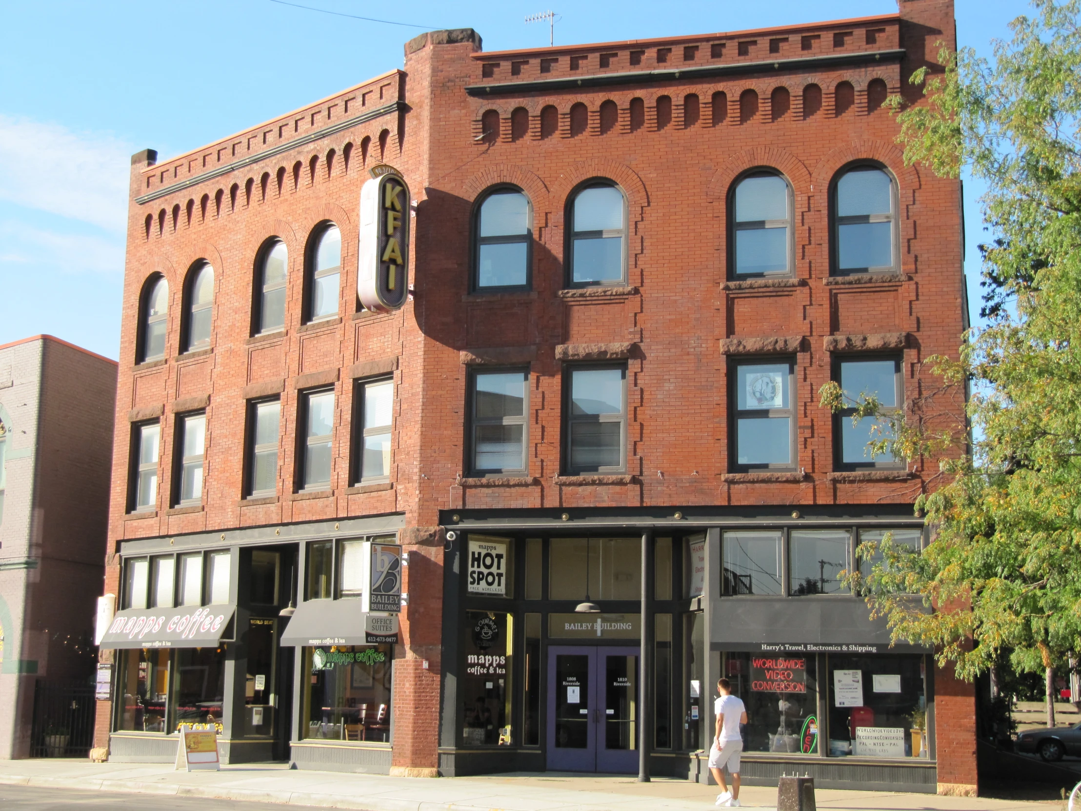 the old brick building has many windows on it