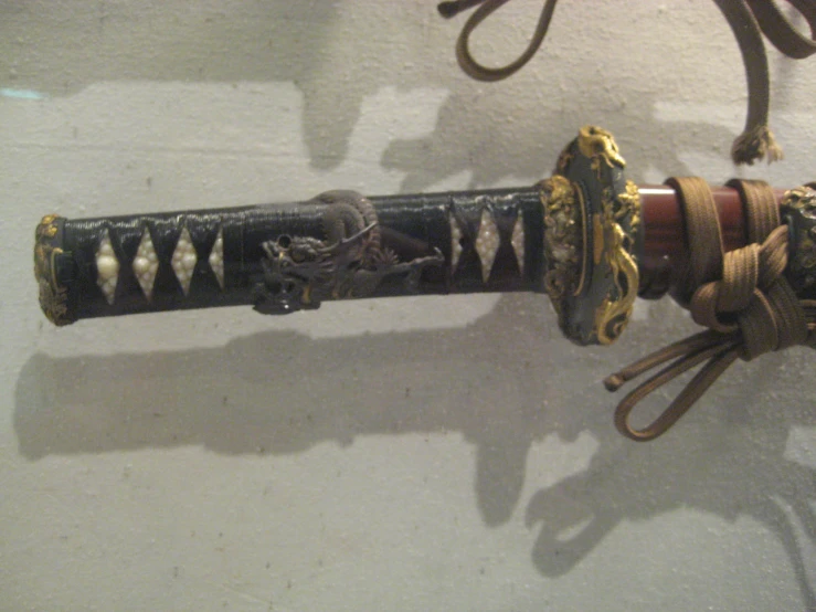 an ornate dagger is on display in the museum