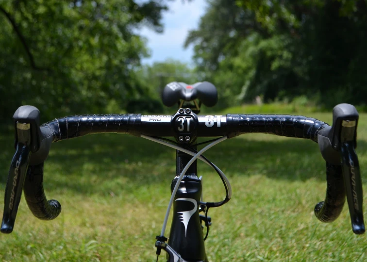 a bicycle handle bar is visible from the handlebars