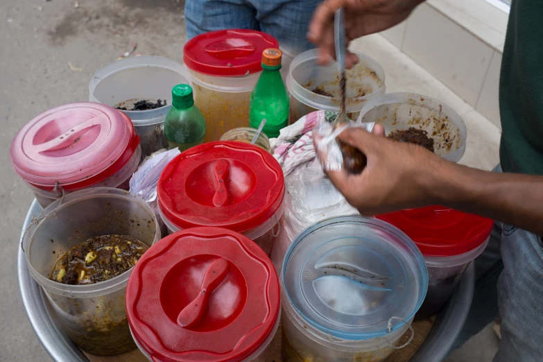 plastic containers filled with food on top of a tray