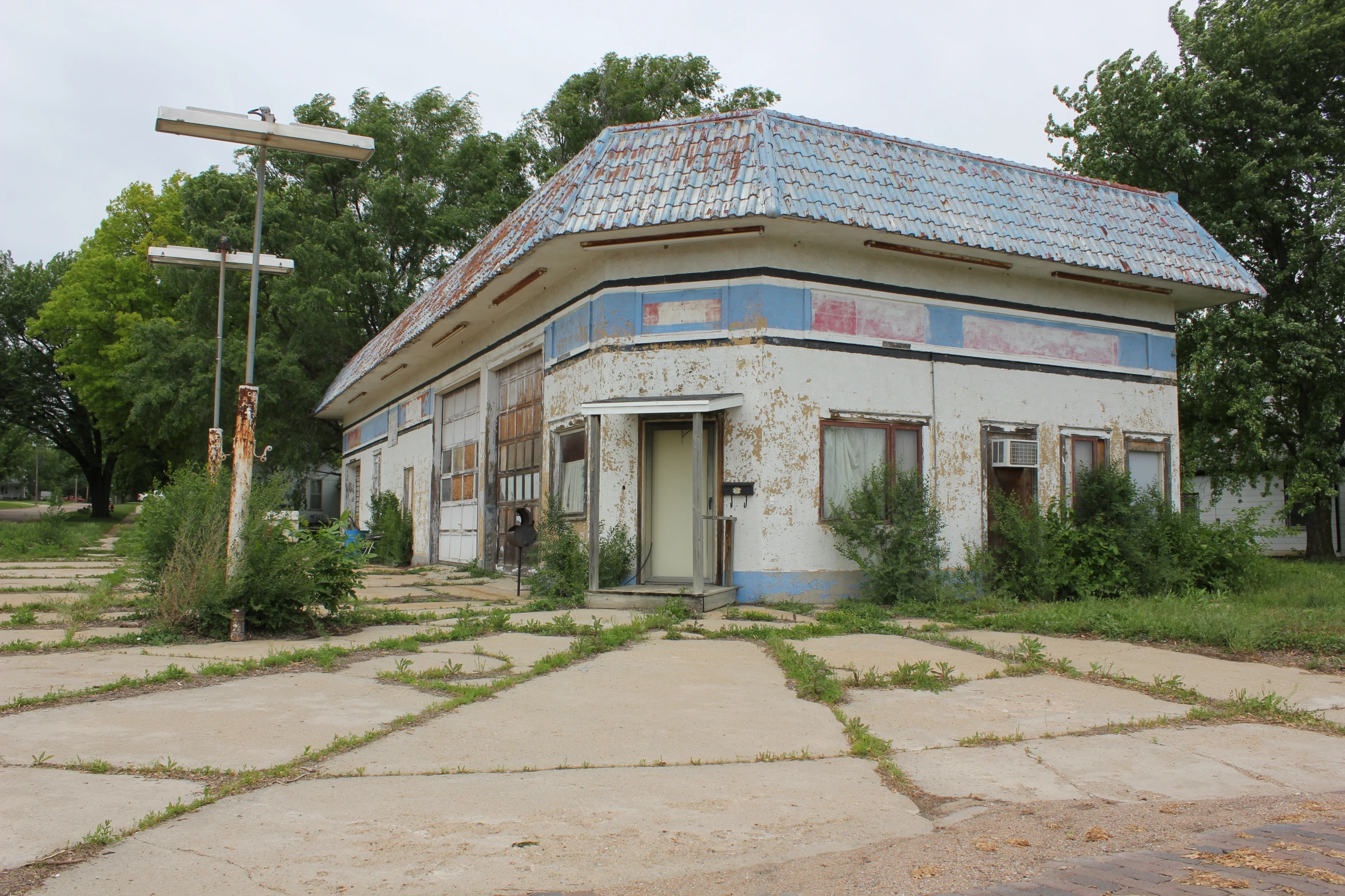 an old run down building with a few broken windows