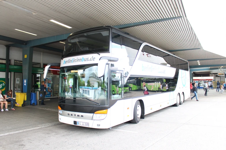 a bus is parked at the bus stop