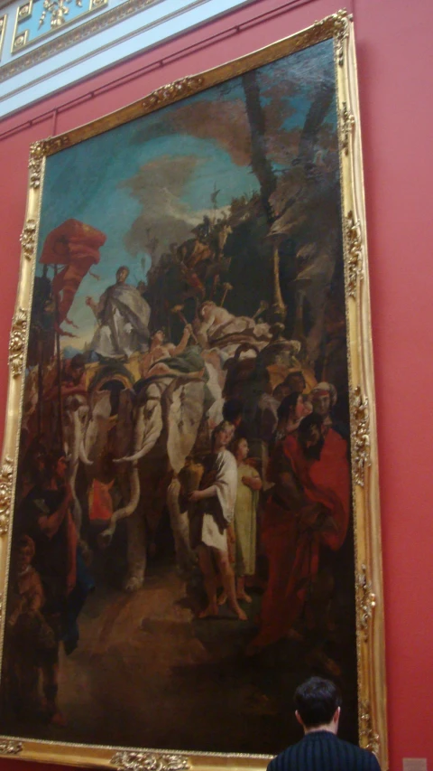a large painting is shown on the wall in a museum