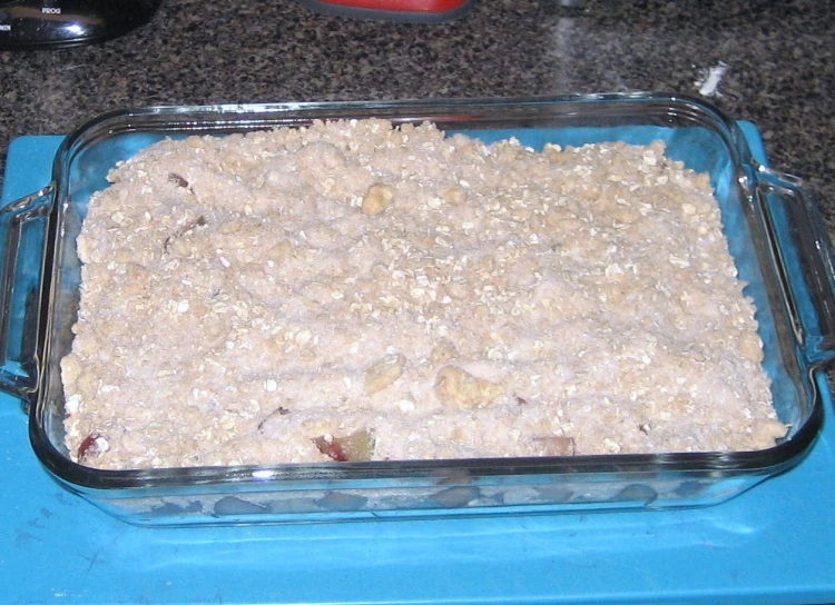 a pan of food on top of a blue counter