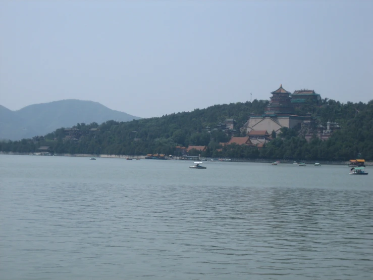 a lake that has boats floating in it