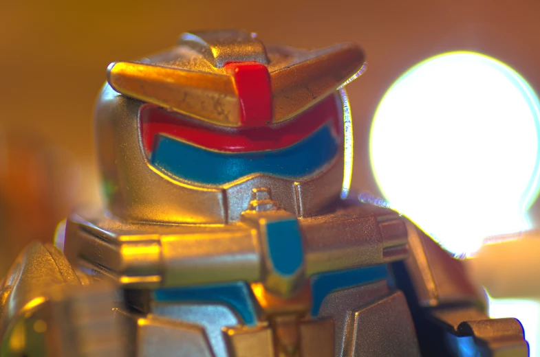 an image of a closeup of the head of a robot toy