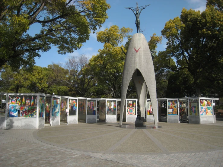 a memorial has various signs and sculptures on display