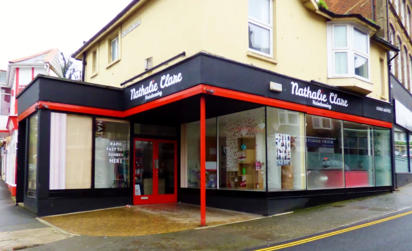 a storefront with shops sitting next to it