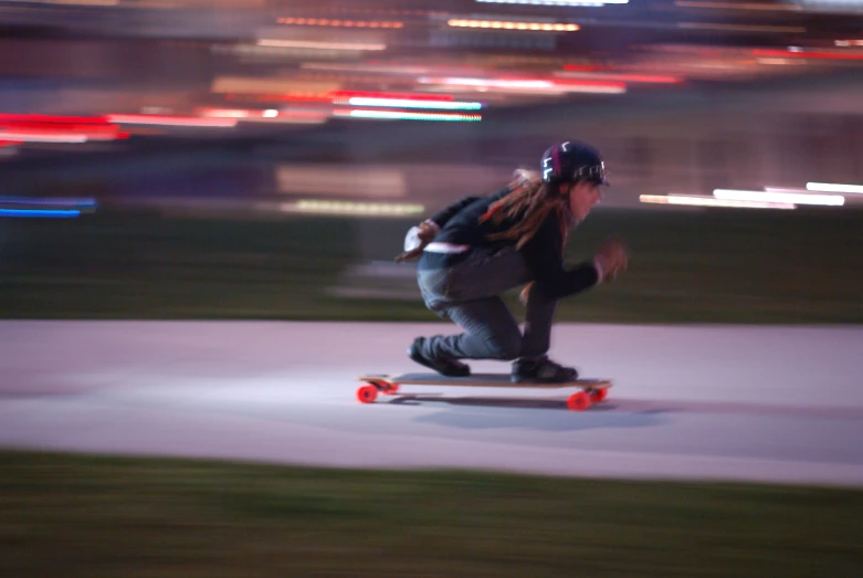 the young person is riding a skateboard outside