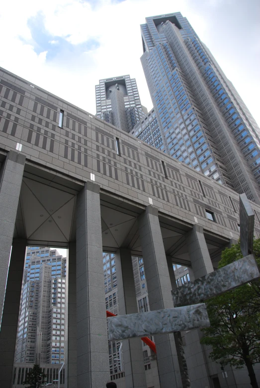 people walking on the street near tall buildings