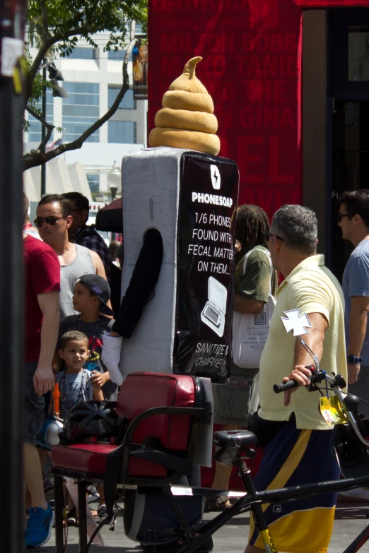 a lady with her child near an office food vending machine