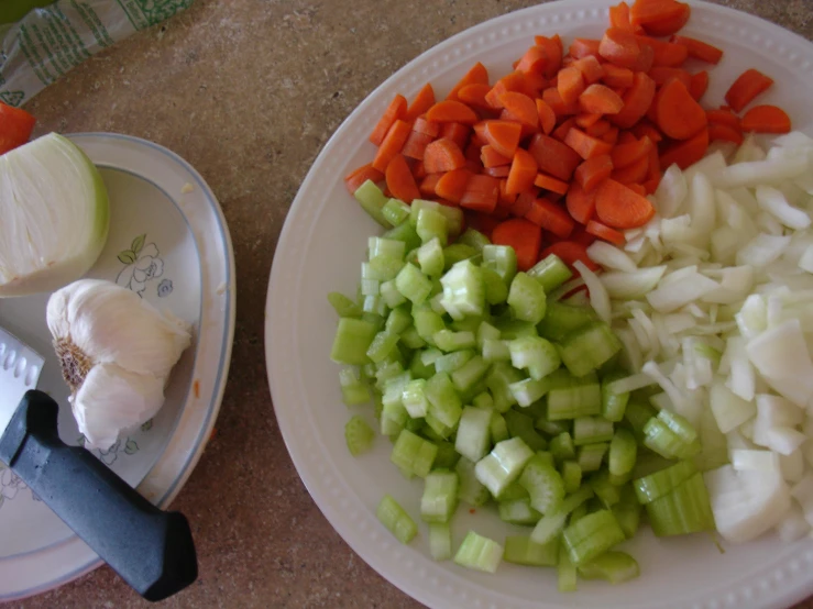 the chopped vegetables have been chopped and are being cut