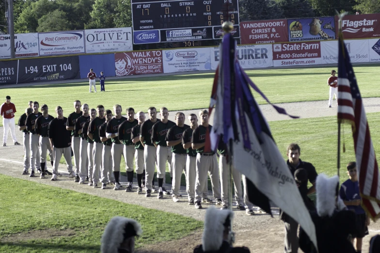 a baseball team is at the end of their ceremony