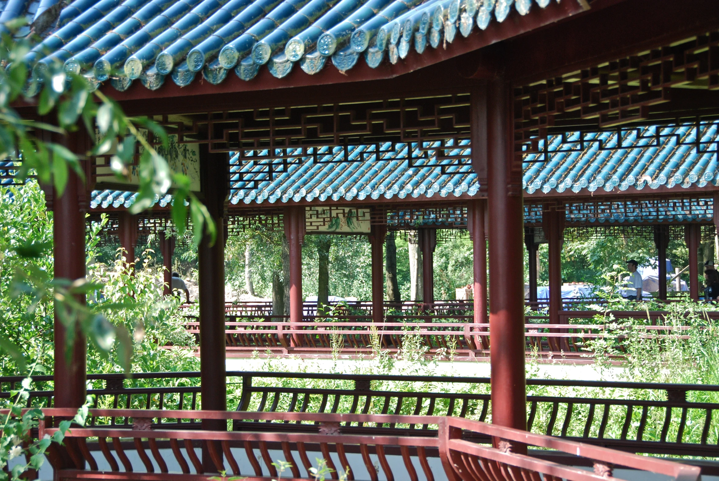 a building with wooden benches in the middle