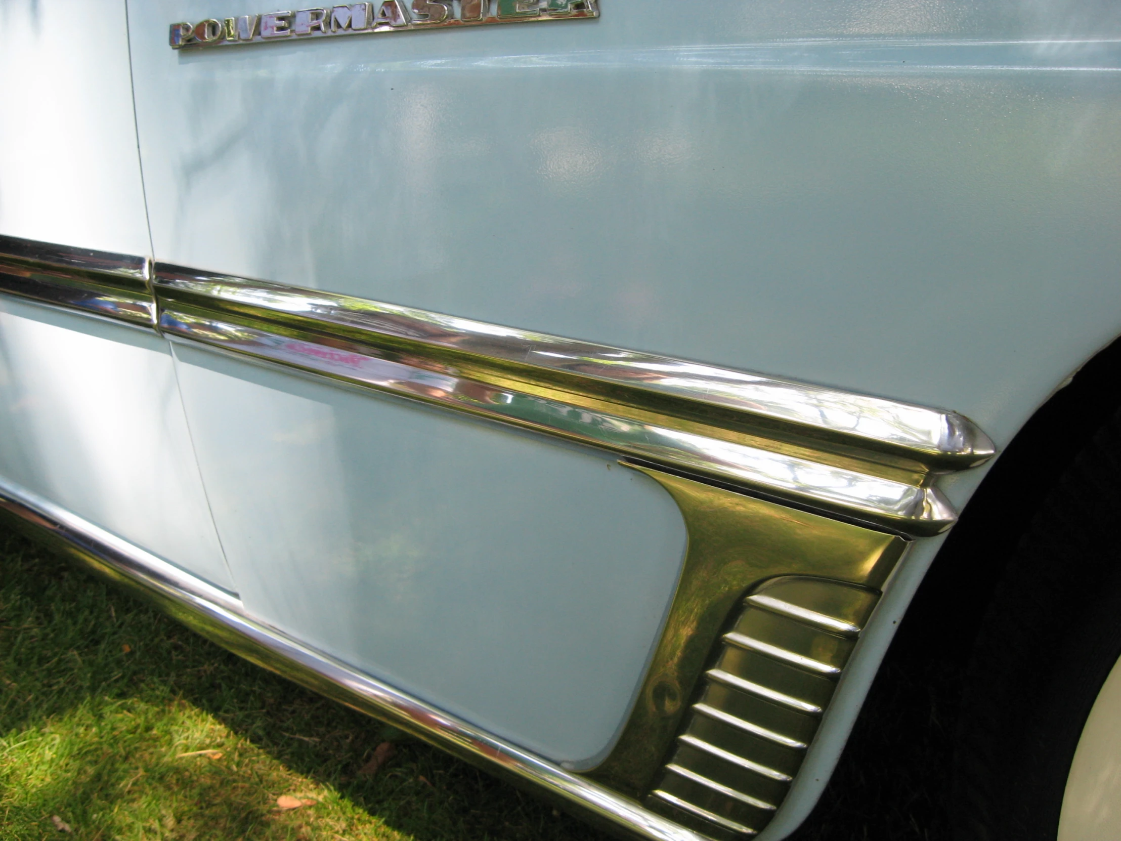 a close up of the chrome of a classic car