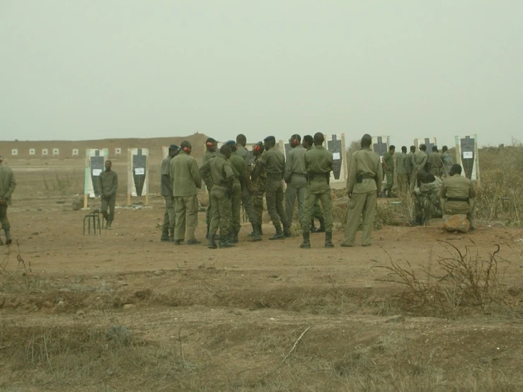 a group of soldiers at a game with guns