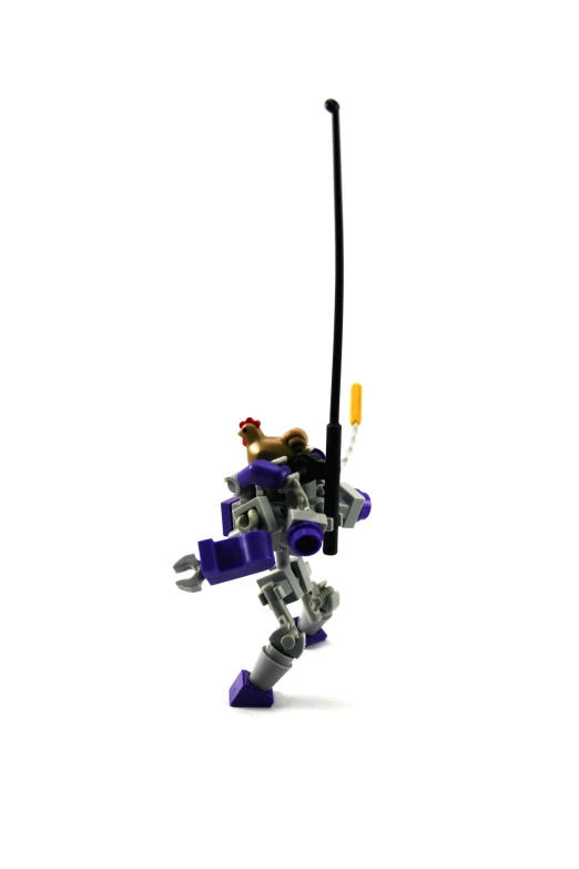 a lego toy is in mid air holding an object