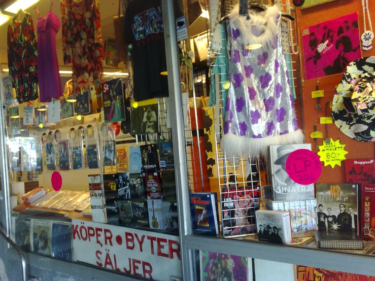 a window with an assortment of comic and other related items