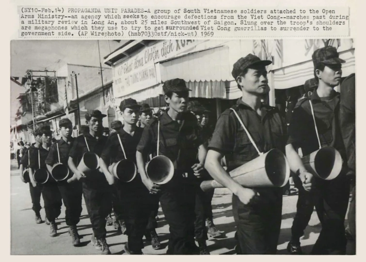 several s with hats on their head walk down a street