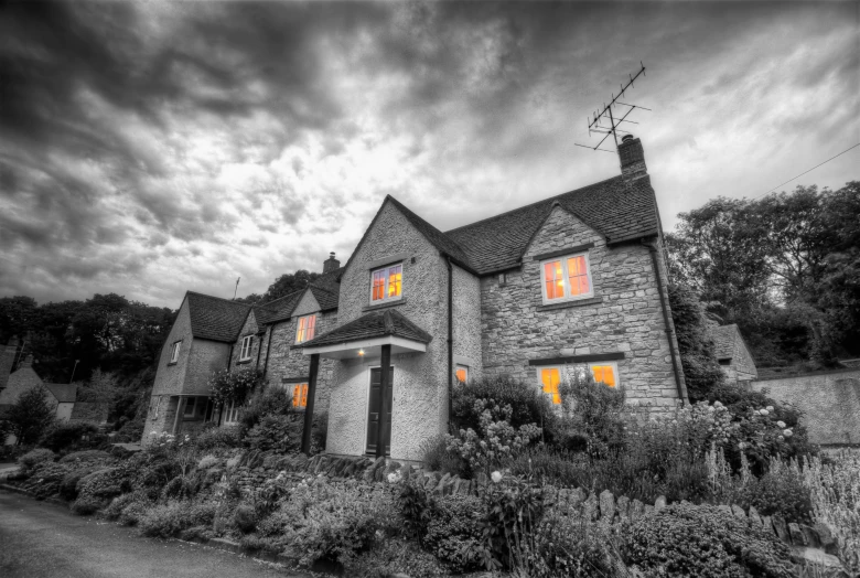 a po of a house in an old, dark country setting