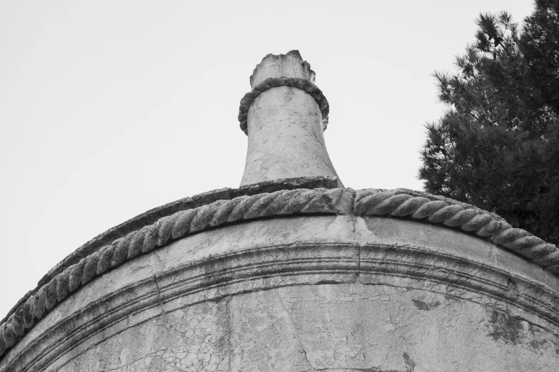 a black and white po of a statue of a woman