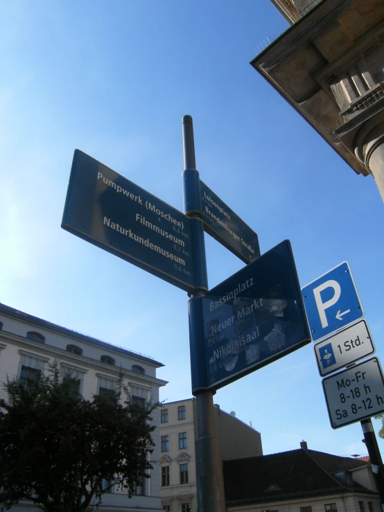 a street sign at an intersection with other signs