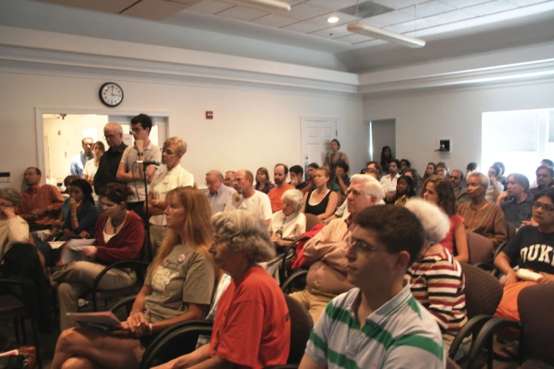 a large group of people in a room