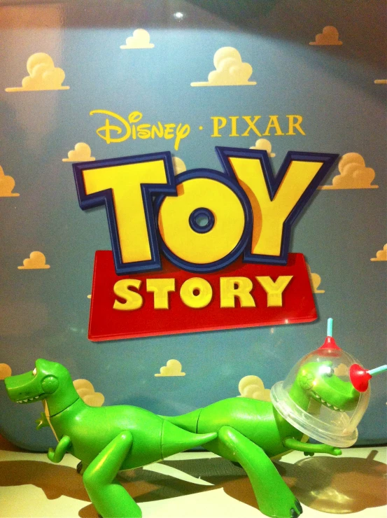 a toy story display on display in front of blue and red wall