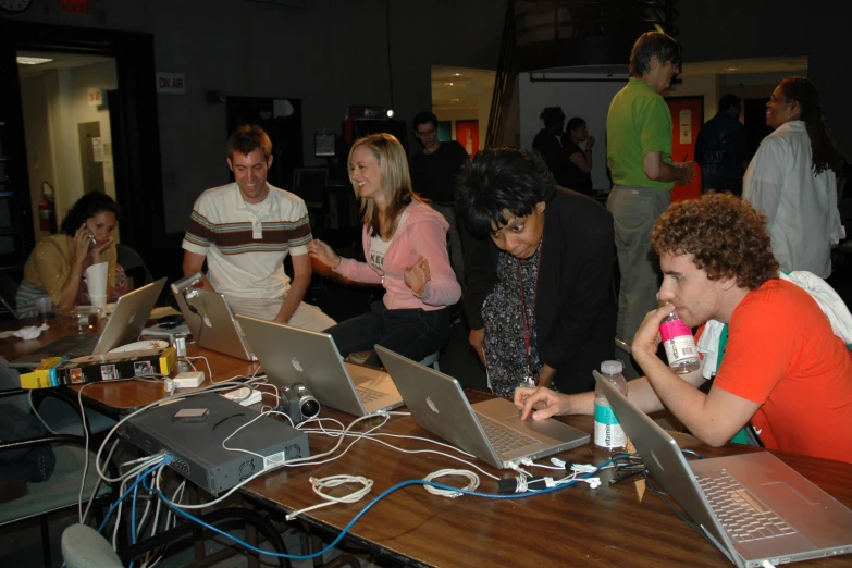 group of people all having their laptops open