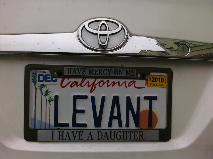 the license plate has been modified to resemble a car's logo