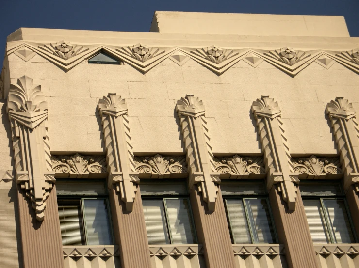 an art deco facade with decorative architectural details