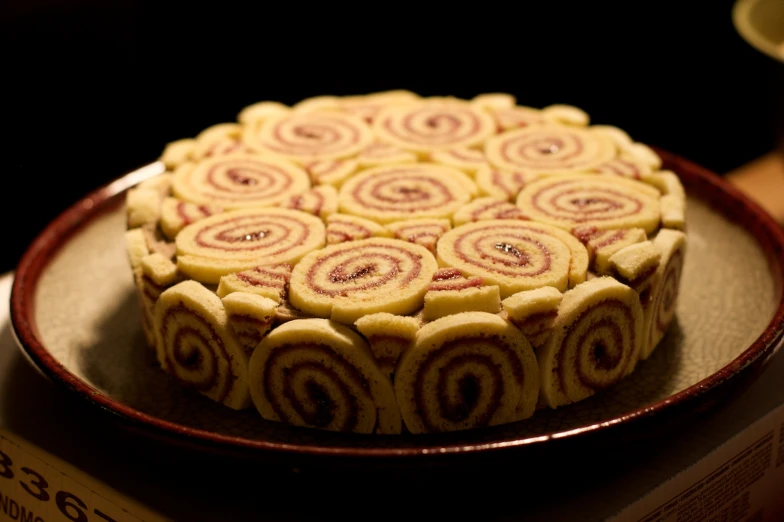 there is a chocolate cake on a platter