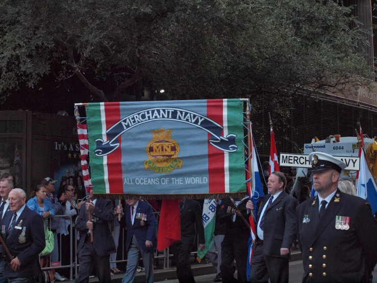 there is an army parade with some military members