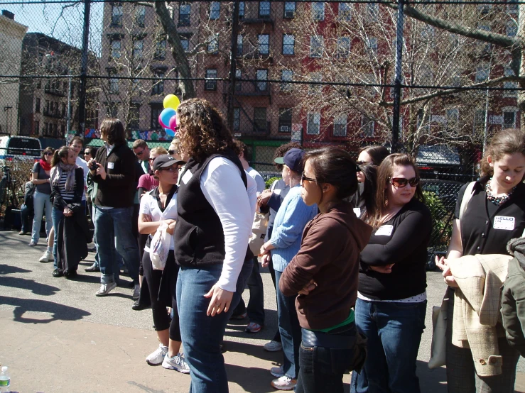 a bunch of people that are standing in the street