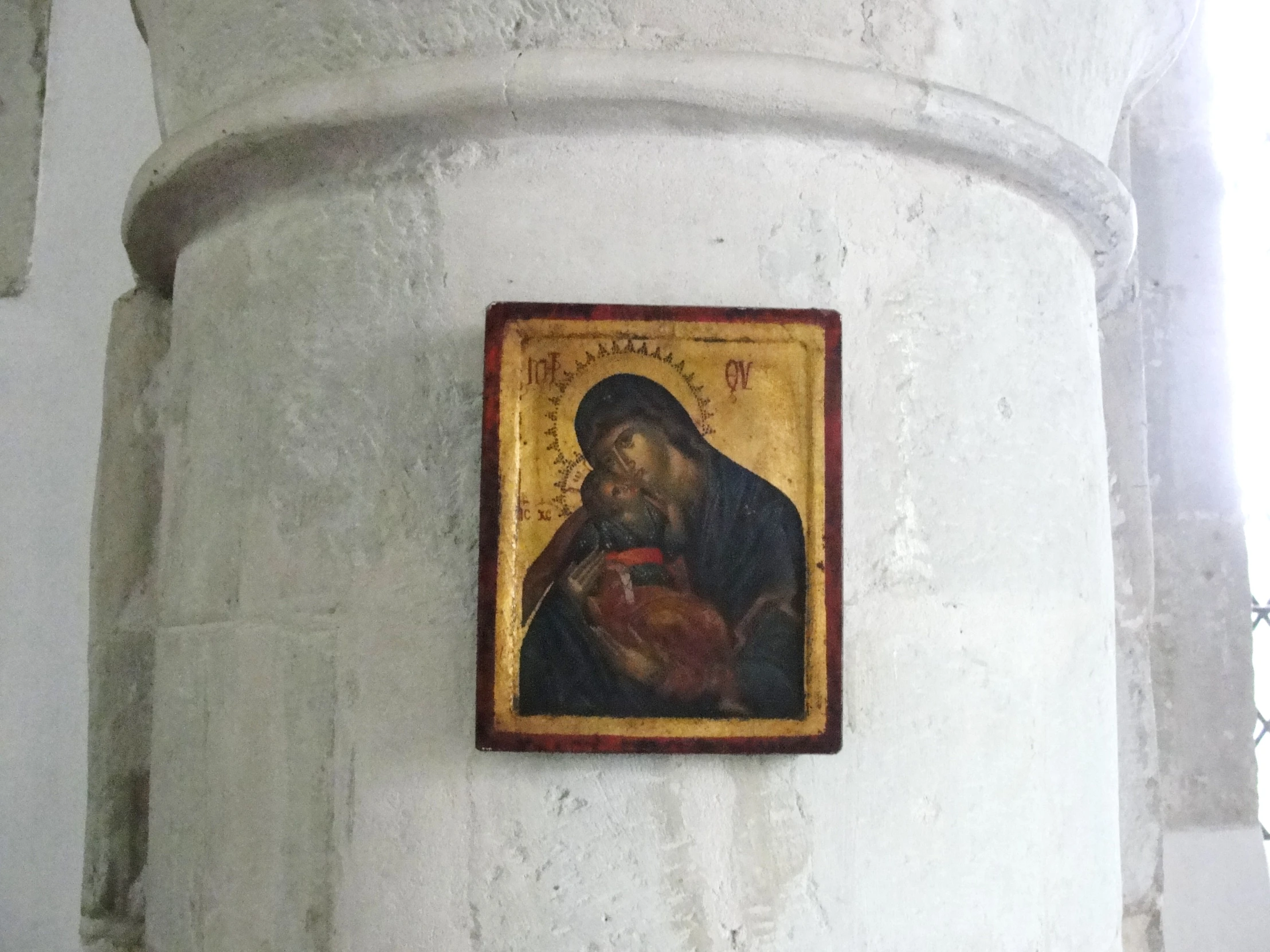 the icon is of st nicholas, who holds a baby jesus