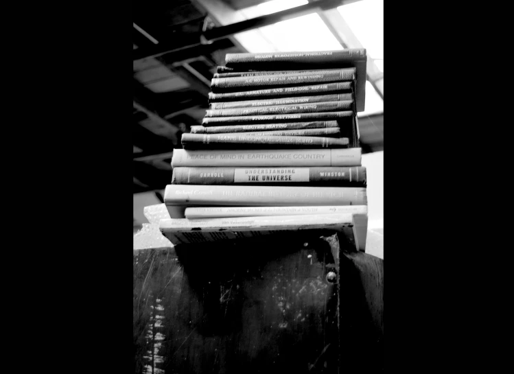 some books stacked on top of each other