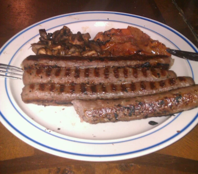 plate of food with meat on it and fork