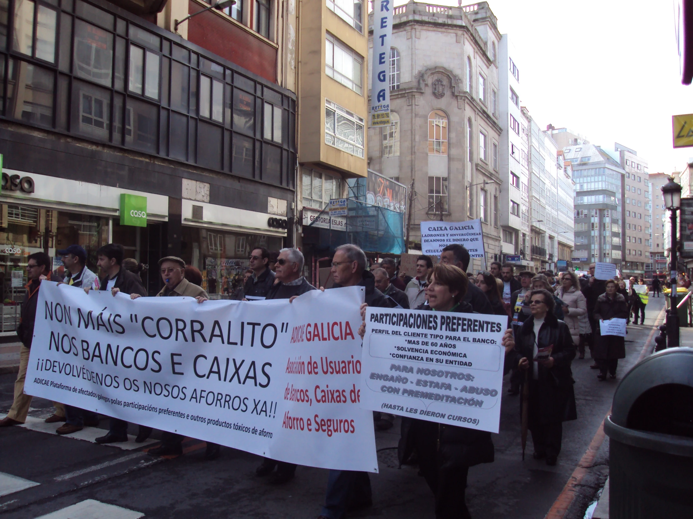 a large group of people are walking down the street