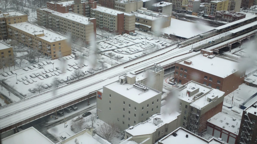 a po taken from a window in the middle of snow