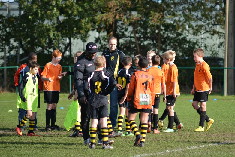 soccer team talking and getting ready for the next play