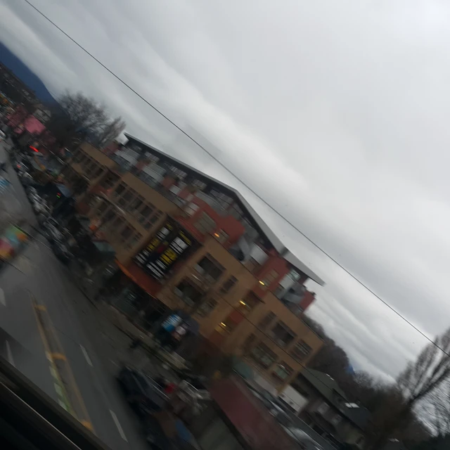 this is the view out a car window of a residential area