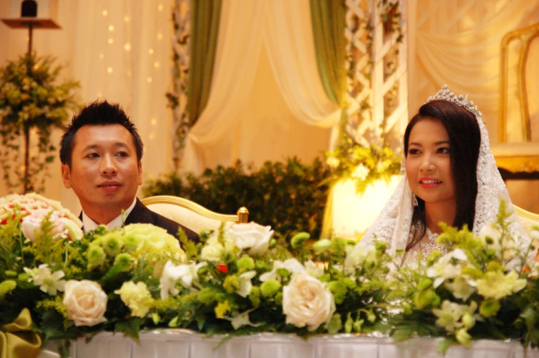 a man and a woman sitting on a chair