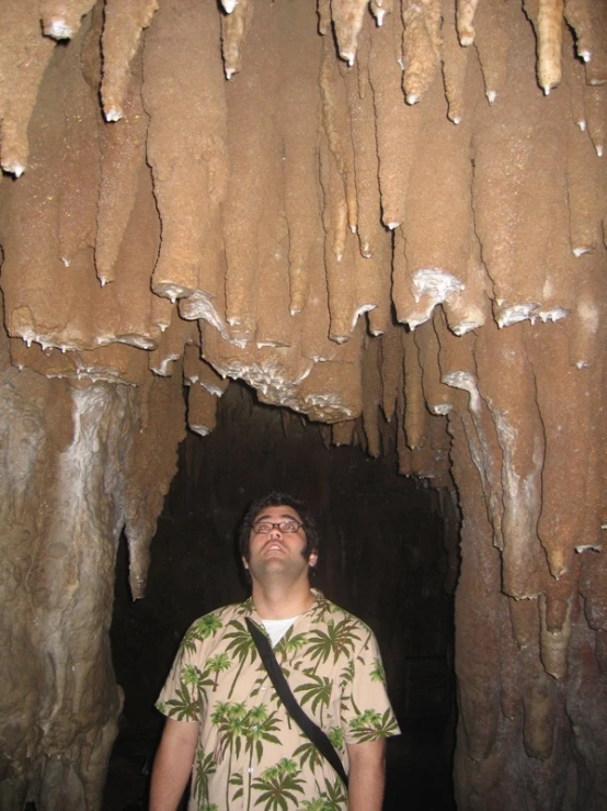 a man standing in front of some formations