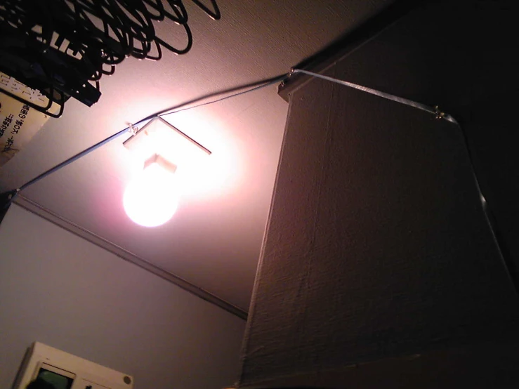 an electrical light is hung up on the wall