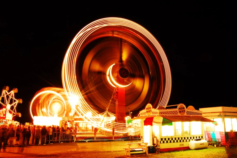 a ferris wheel that has a large number of people