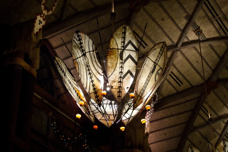 large lamps hanging from the ceiling on the roof