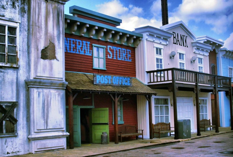 a bunch of old buildings with wooden balconies