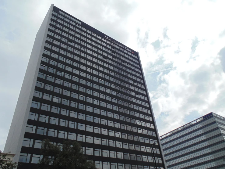 a building that is very tall with lots of windows