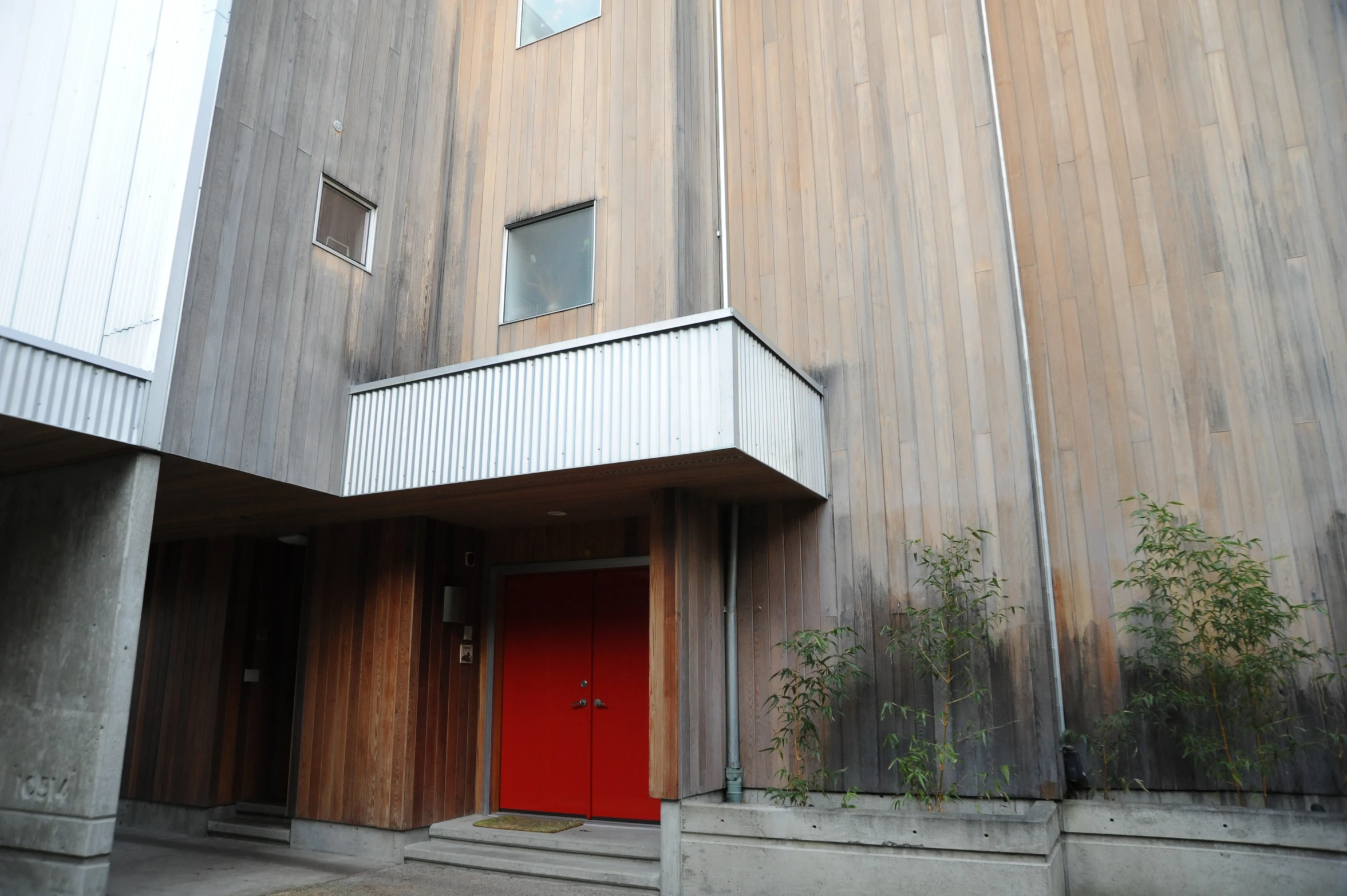 a building has a red door on the side